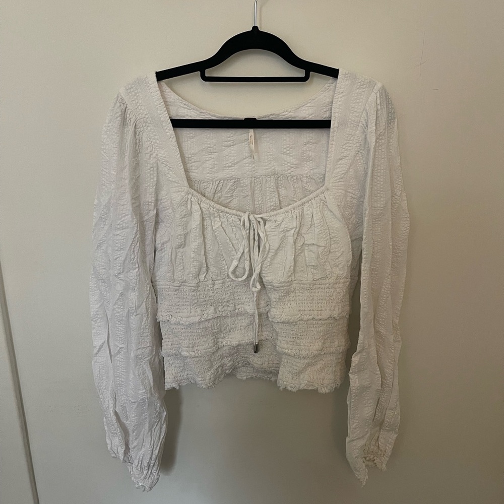 Free people too with balloon sleeve detail and scoop neckline